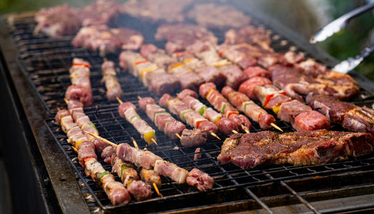 Authentic Kenyan nyama choma grilled over charcoal with kachumbari and ugali